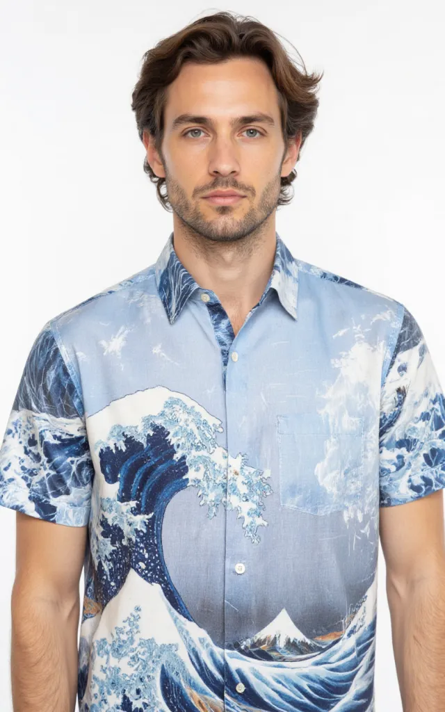 A French model wearing a Wave pattern   printed shirt, against a white background, in a front   facing bust portrait